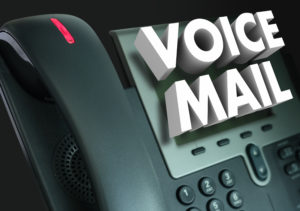 Landline phone with 3D words "Voice mail" coming off the screen